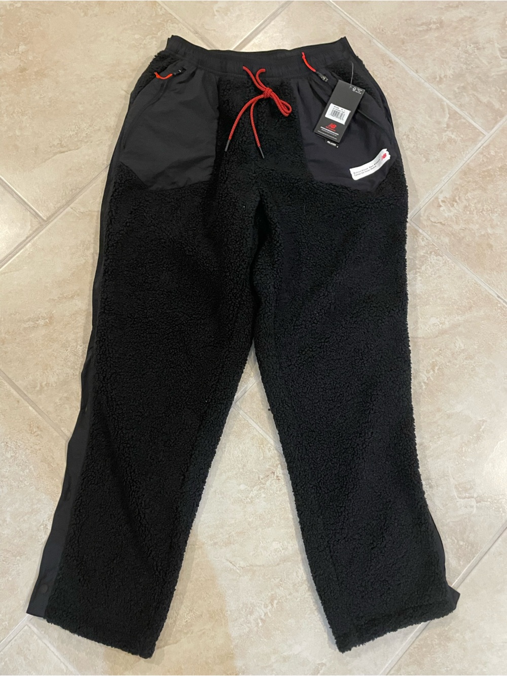 New Balance Black Sherpa Joggers with Red Drawstring Accent